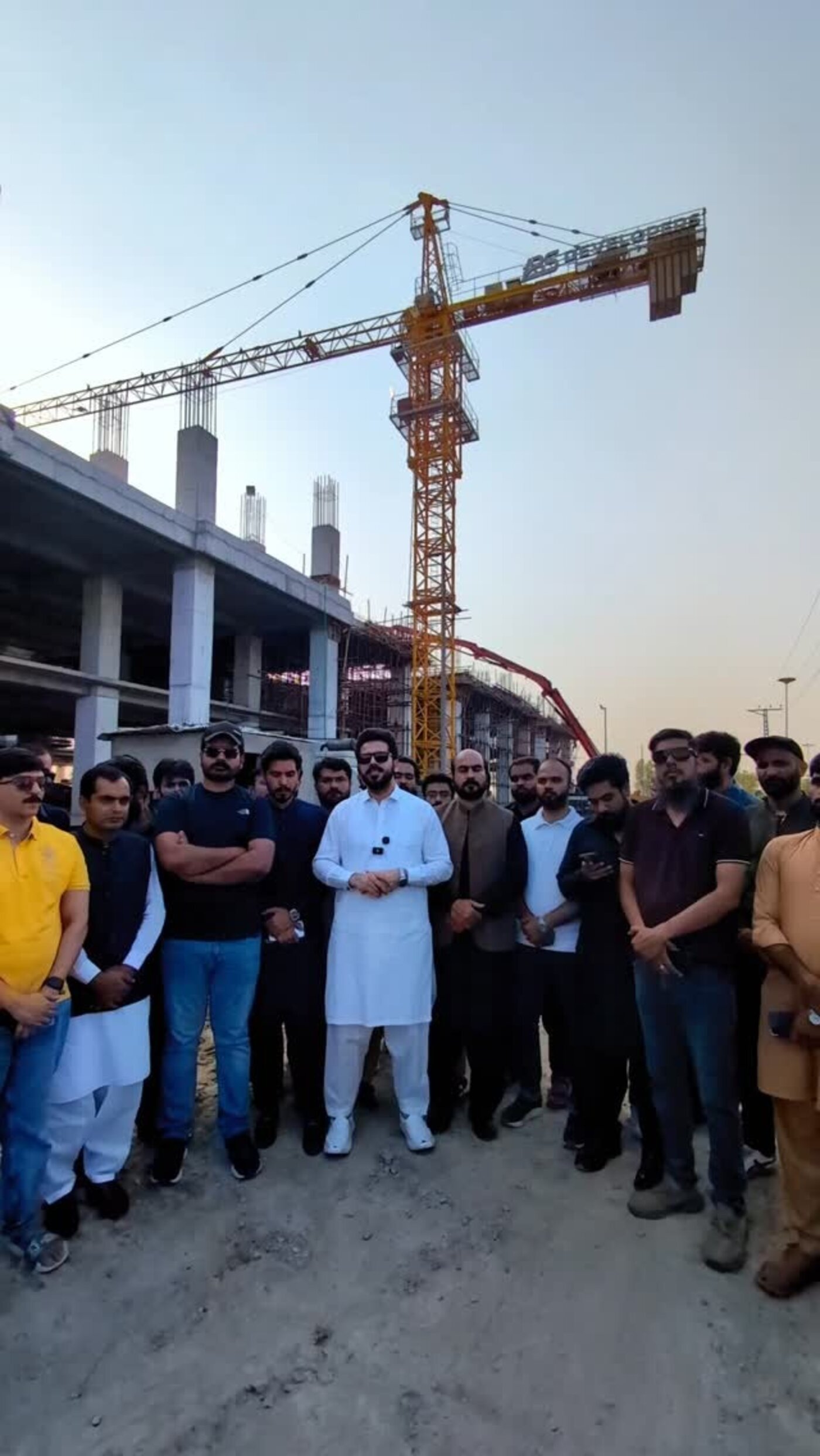 Qasim Bajwa with the QB ABS team on a project site visit